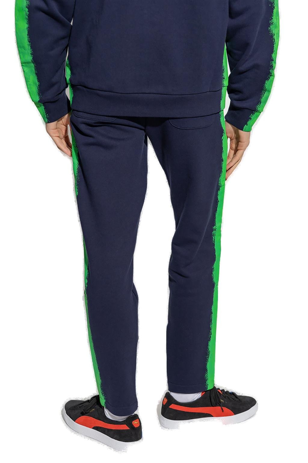 Moschino Logo Printed Tapered Sweat Pants